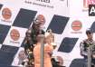 Yogi Adityanath presents trophy to winner of MotoGP Grand