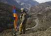 An Armenian soldier standing in front of Nagorno-Karabakh