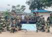 Security forces after uncovering a Naxal weapons workshop