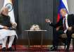 Russian President Vladimir Putin and Prime Minister Narendra Modi attend a meeting on the sidelines 