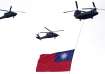 Helicopters fly over with Taiwan national flag during an inauguration celebration of Taiwan's Presid