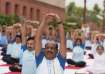 Om Birla performs Yoga