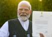 PM Narendra Modi with his letter of his appointment as