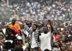 People attend a music concert at the Stade des Martyrs of Kinshasa, Democratic Republic of Congo.