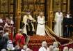 King Charles III addresses hundreds of lawmakers and scarlet-robed members of the House of Lords.