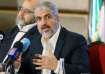 Hamas leader Khaled Meshaal gestures as he announces a new policy document in Doha, Qatar, May 1, 20
