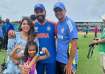 Rohit Sharma with his family and Rahul Dravid.