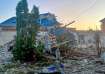 A amaged house after shelling by the Ukrainian side in the city of Sudzha, Kursk region that borders