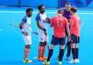 Harmanpreet Singh sees the umpire talking to Britain's Sam