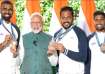 PM Modi with the Indian hockey team.