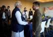 Ukraine's President Volodymyr Zelensky and Indian Prime Minister Narendra Modi shake hands during th