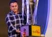 Virender Sehwag with DPL trophy.