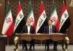 Iranian President Masoud Pezeshkian and Iraqi Prime Minister Mohammed Shia al-Sudani attend the sign