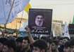 Hezbollah supporters with a poster of Hassan Nasrallah