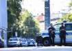 Police officer block a street after police fired shots at a suspicious person near the Israeli Consu