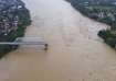 A bridge collapse due to floods triggered by typhoon Yagi