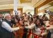 Prime Minister Narendra Modi interacts with members of the Indian diaspora, in Brunei.