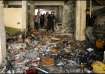 Palestinians inspect a school, which was sheltering