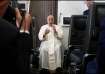 Pope Francis holds a news conference aboard the papal plane.