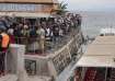 People gather at the port of Goma, Democratic Republic of