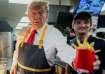 Donald Trump prepares french fries at McDonald's