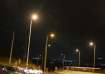 Cars move on a road as projectiles launched from Iran are