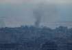 Smoke billows from an Israeli strike near Beirut's Rafic