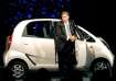 ata Group Chairman, Ratan Tata, steps out from the company's new "Nano" car during its launch at the