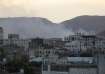 Smoke rises from the site of strikes in Sanaa