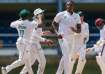 Temba Bavuma celebrates with Kagiso Rabada.