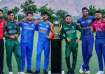 Captains of all eight teams pose with the trophy in Muscat.