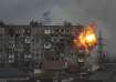 An explosion erupts from an apartment building at 110 Mytropolytska St., after a Russian army tank f