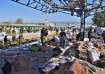 Security officials examine the site of a bomb explosion at railway station in Quetta