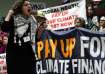 Activists participate in a demonstration for climate finance at the COP29 UN Climate Summit