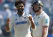 Ravindra Jadeja celebrates Glenn Phillips' wicket.