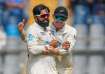 Tom Latham and Ajaz Patel celebrate a wicket on day three of Mumbai Test.