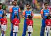 Ravi Bishnoi, Avesh Khan, Rinku Singh and Suryakumar Yadav line up for the national anthem.