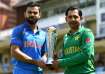 Virat Kohli and Sarfaraz Ahmed pose with the ICC Champions Trophy silverware.