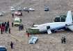 The wreckage of Azerbaijan Airlines Embraer 190 lays on the ground near the airport of Aktau, Kazakh