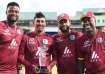 West Indies players pose with the ODI trophy.