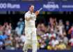 Travis Head celebrates his century at the Gabba against India.