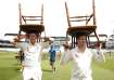 Steve Smith and Marnus Labuschagne carry chairs