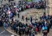 Mourners laid flowers near the scene of the deadly Christmas market attack. 