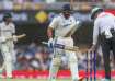 Rohit Sharma and KL Rahul run off after the final rain