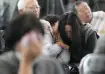 Mourners wait to pay tribute to the victims of a plane fire at a memorial altar at Muan Internationa