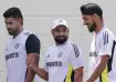 Harshit Rana (L), Mohammed Shami (C) and Arshdeep Singh (R)