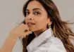 Deepika Padukone in a white shirt with soft glam makeup and flowing hair