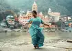 Scenic view of Rishikesh with river, temples 