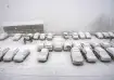 Shimla: Vehicles lie covered under fresh snowfall in a parking area, in Shimla, Friday, Jan. 23, 202
