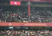 Fans at the Chinnaswamy Stadium